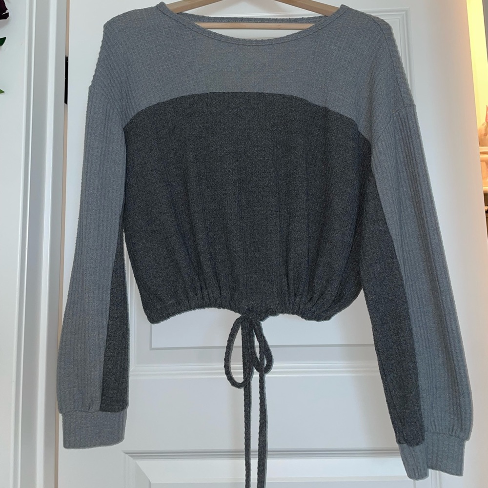 Gray sweater top.
